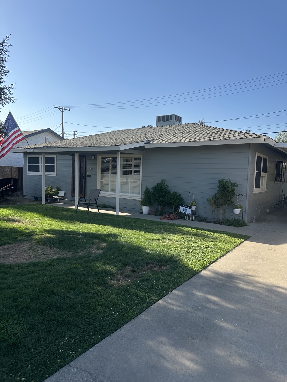 Gray home exterior painting project