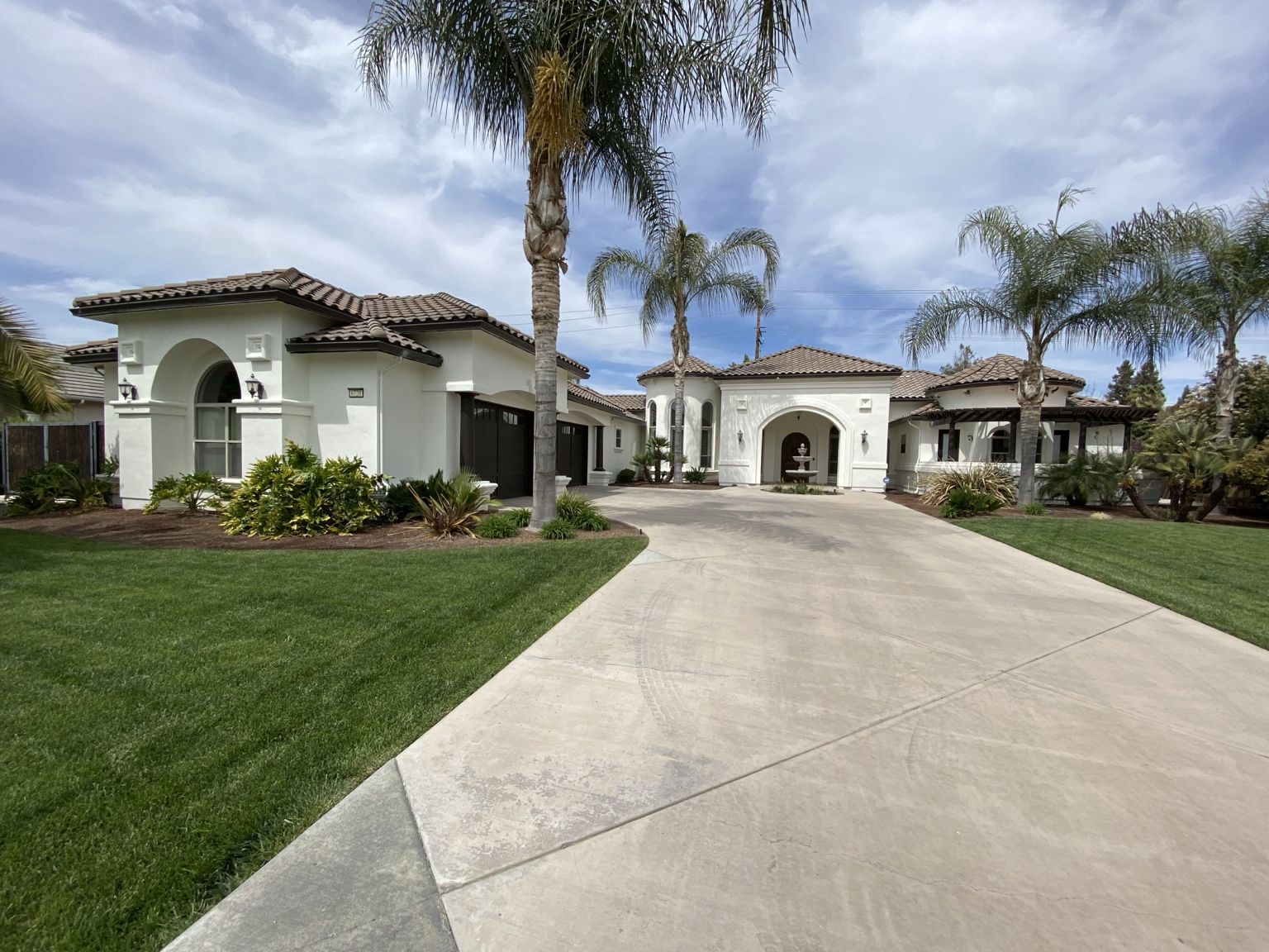White stucco home exterior painting project