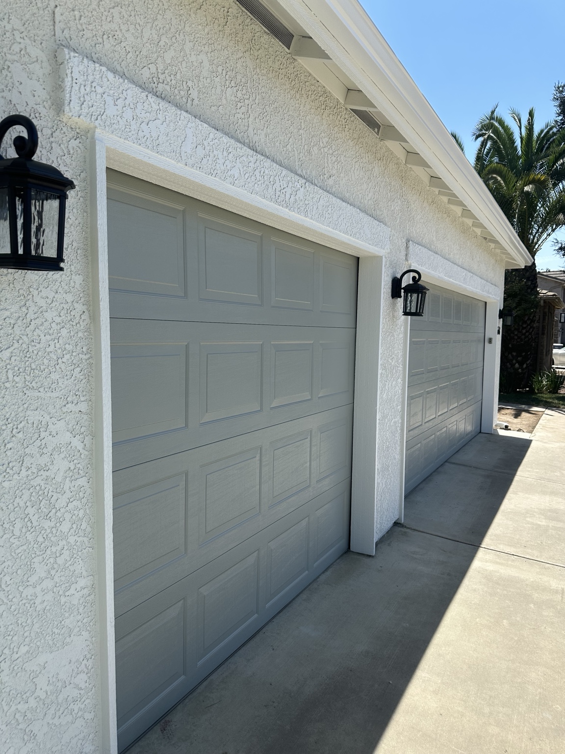 Painted garage doors and exterior trim